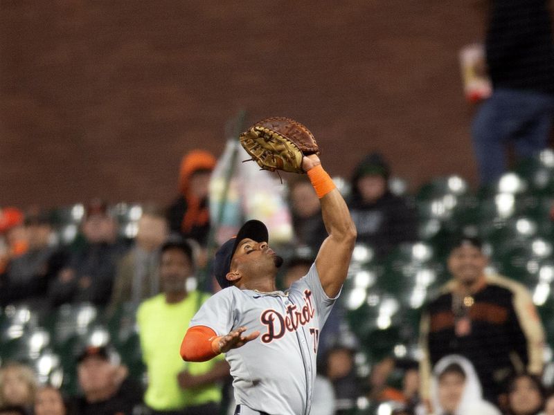 Aug 9, 2024; San Francisco, California, USA; Detroit Tigers first baseman Andy Ibáñez (77) catches a foul popup by San Francisco Giants third baseman Matt Chapman during the fifth inning at Oracle Park. Mandatory Credit: D. Ross Cameron-USA TODAY Sports