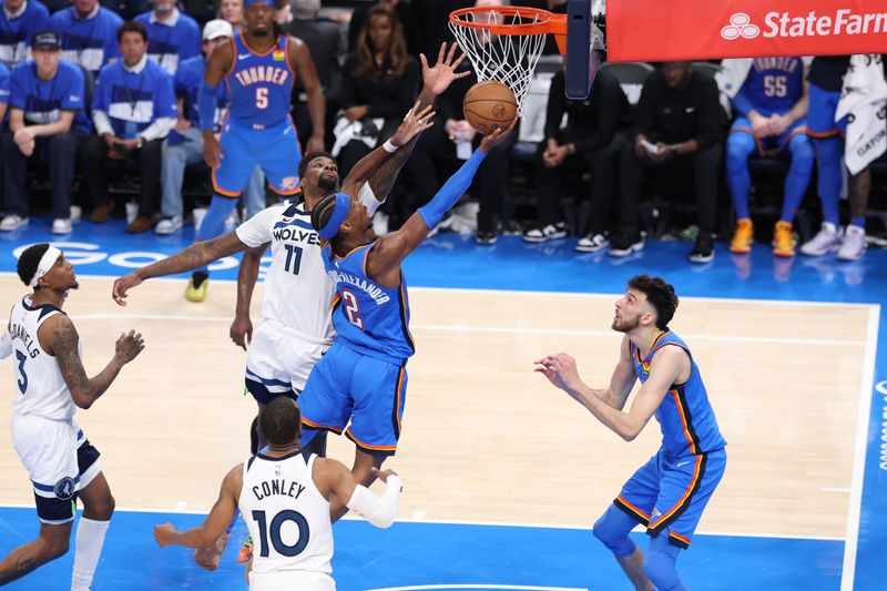 OKLAHOMA CITY, OK - MAY 22: Shai Gilgeous-Alexander #2 of the Oklahoma City Thunder drives to the basket during the game against the Minnesota Timberwolves during Game Two of the 2025 Western Conference Finals on May 22, 2025 at Paycom Center in Oklahoma City, Oklahoma. NOTE TO USER: User expressly acknowledges and agrees that, by downloading and or using this Photograph, user is consenting to the terms and conditions of the Getty Images License Agreement. Mandatory Copyright Notice: Copyright 2025 NBAE (Photo by David Sherman/NBAE via Getty Images)
