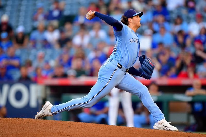 Aug 13, 2024; Anaheim, California, USA; Toronto Blue Jays pitcher Kevin Gausman (34) throws against the Los Angeles Angels during the first inning at Angel Stadium. Mandatory Credit: Gary A. Vasquez-USA TODAY Sports