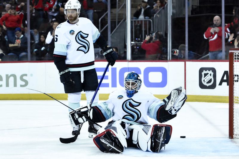 Feb 12, 2024; Newark, New Jersey, USA; Seattle Kraken goaltender Joey Daccord (35) reacts during the second period against the New Jersey Devils at Prudential Center. Mandatory Credit: John Jones-USA TODAY Sports