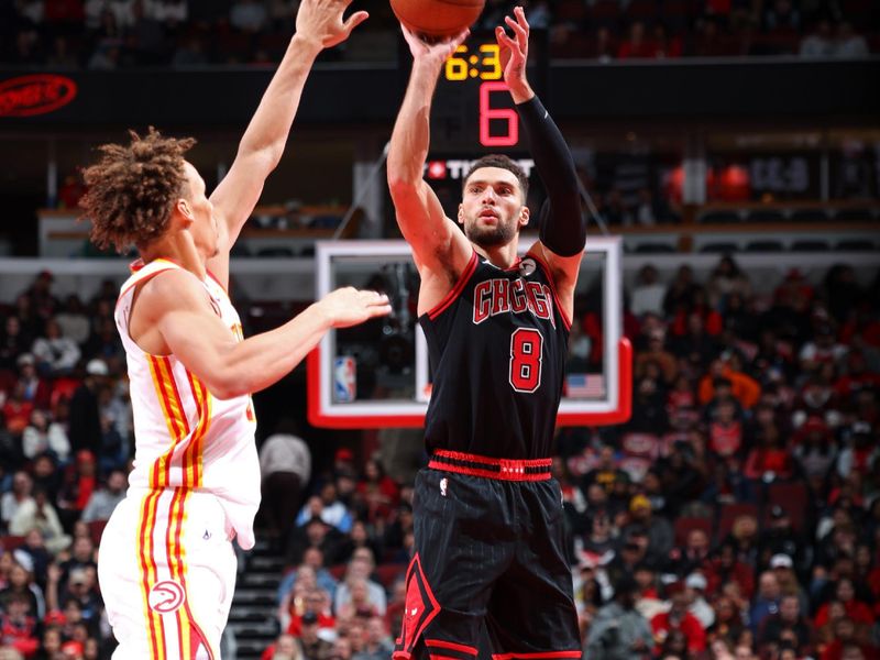 CHICAGO, IL - NOVEMBER 22: Zach LaVine #8 of the Chicago Bulls three point basket during the game against the Atlanta Hawks during the Emirates NBA Cup game on November 22, 2024 at United Center in Chicago, Illinois. NOTE TO USER: User expressly acknowledges and agrees that, by downloading and or using this photograph, User is consenting to the terms and conditions of the Getty Images License Agreement. Mandatory Copyright Notice: Copyright 2024 NBAE (Photo by Jeff Haynes/NBAE via Getty Images)