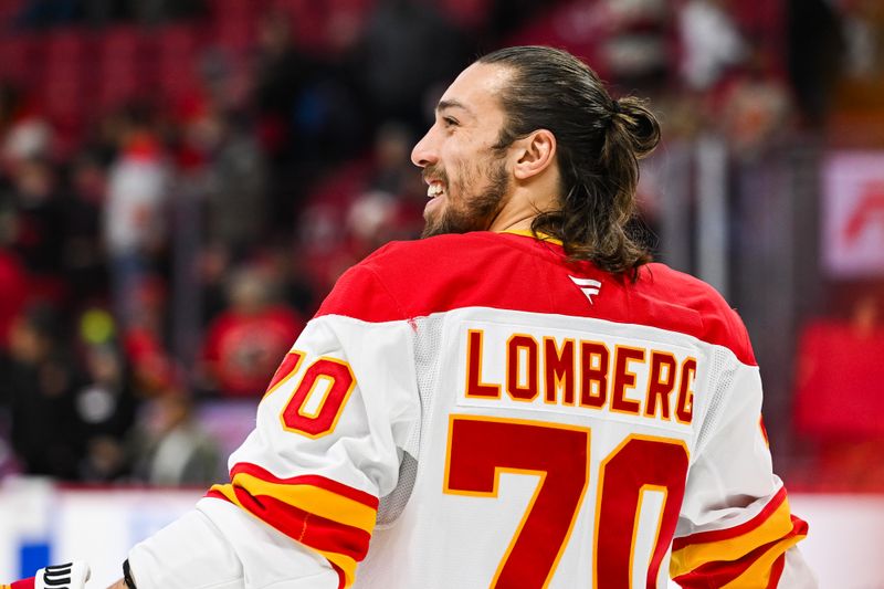 Nov 25, 2024; Ottawa, Ontario, CAN; Calgary Flames left wing Ryan Lomberg (70) looks ojn during warm-up before the game against the Ottawa Senators at Canadian Tire Centre. Mandatory Credit: David Kirouac-Imagn Images