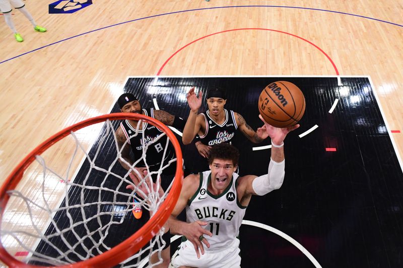 LOS ANGELES, CA - FEBRUARY 10: Brook Lopez #11 of the Milwaukee Bucks shoots the ball during the game against the LA Clippers on February 10, 2023 at Crypto.Com Arena in Los Angeles, California. NOTE TO USER: User expressly acknowledges and agrees that, by downloading and/or using this Photograph, user is consenting to the terms and conditions of the Getty Images License Agreement. Mandatory Copyright Notice: Copyright 2023 NBAE (Photo by Adam Pantozzi/NBAE via Getty Images)