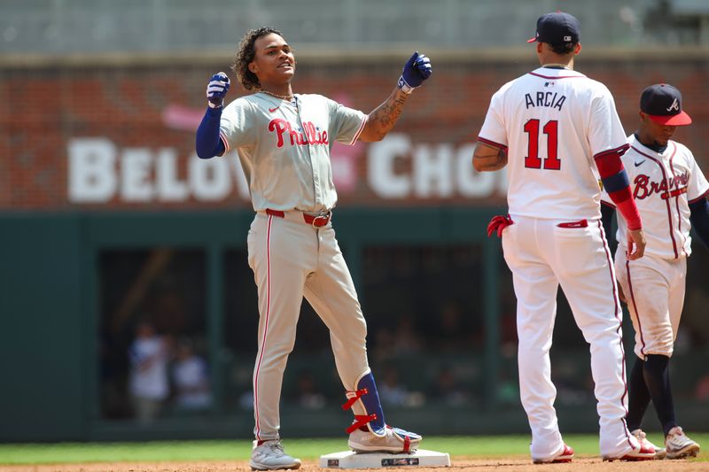 Jul 7, 2024; Atlanta, Georgia, USA; Philadelphia Phillies outfielder Cristian Pache (19) reacts after a double against the Atlanta Braves in the ninth inning at Truist Park. Mandatory Credit: Brett Davis-USA TODAY Sports