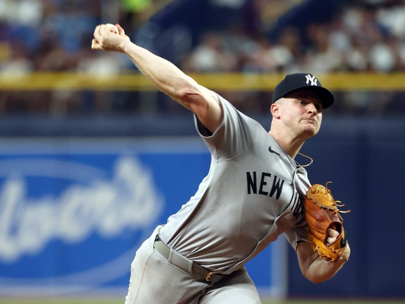 May 10, 2024; St. Petersburg, Florida, USA; New York Yankees pitcher Clarke Schmidt (36) throws a pitch against the Tampa Bay Rays during the third inning at Tropicana Field. Mandatory Credit: Kim Klement Neitzel-USA TODAY Sports