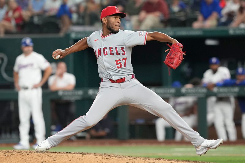 Sep 7, 2024; Arlington, Texas, USA; Los Angeles Angels relief pitcher Roansy Contreras (57) delivers against the Texas Rangers during the eighth inning at Globe Life Field. Mandatory Credit: Jim Cowsert-Imagn Images