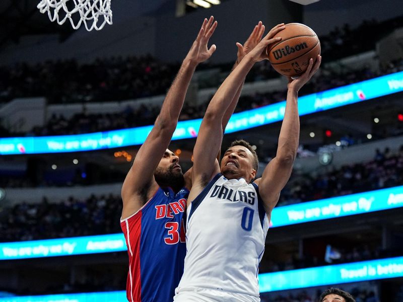 DALLAS, TX - OCTOBER 20: Dante Exum #0 of the Dallas Mavericks drives to the basket during the game against the Detroit Pistons on October 20, 2023 at the American Airlines Center in Dallas, Texas. NOTE TO USER: User expressly acknowledges and agrees that, by downloading and or using this photograph, User is consenting to the terms and conditions of the Getty Images License Agreement. Mandatory Copyright Notice: Copyright 2023 NBAE (Photo by Glenn James/NBAE via Getty Images)