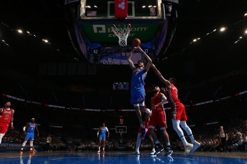 OKLAHOMA CITY, OK - APRIL 24: Chet Holmgren #7 of the Oklahoma City Thunder dunks the ball during the game against the New Orleans Pelicans during Round 1 Game 2 of the 2024 NBA Playoffs on April 24, 2024 at Paycom Arena in Oklahoma City, Oklahoma. NOTE TO USER: User expressly acknowledges and agrees that, by downloading and or using this photograph, User is consenting to the terms and conditions of the Getty Images License Agreement. Mandatory Copyright Notice: Copyright 2024 NBAE (Photo by Zach Beeker/NBAE via Getty Images)