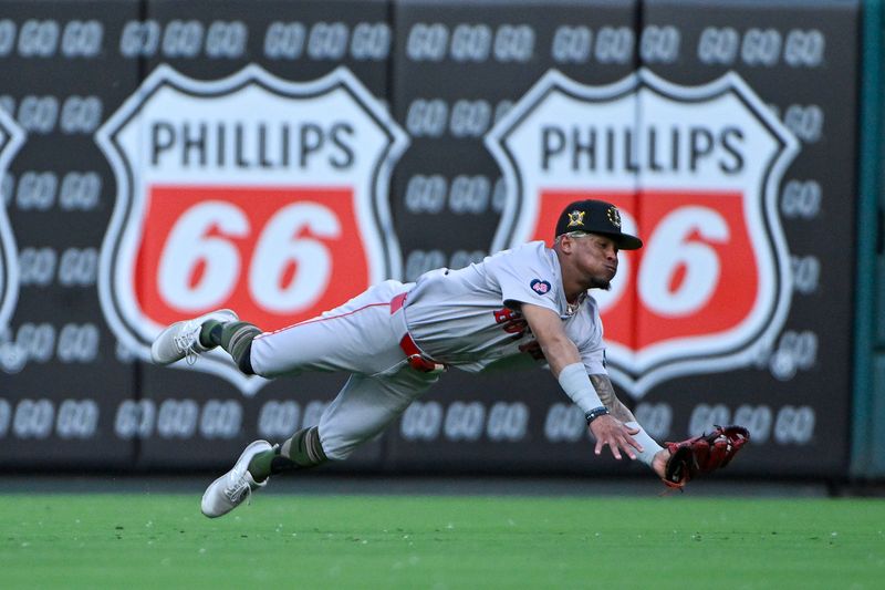 May 18, 2024; St. Louis, Missouri, USA;  Boston Red Sox center fielder Ceddanne Rafaela (43) dives and catches a line drive against the St. Louis Cardinals during the first inning at Busch Stadium. Mandatory Credit: Jeff Curry-USA TODAY Sports