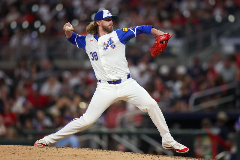 Aug 24, 2024; Atlanta, Georgia, USA; Atlanta Braves relief pitcher Pierce Johnson (38) throws against the Washington Nationals in the ninth inning at Truist Park. Mandatory Credit: Brett Davis-USA TODAY Sports