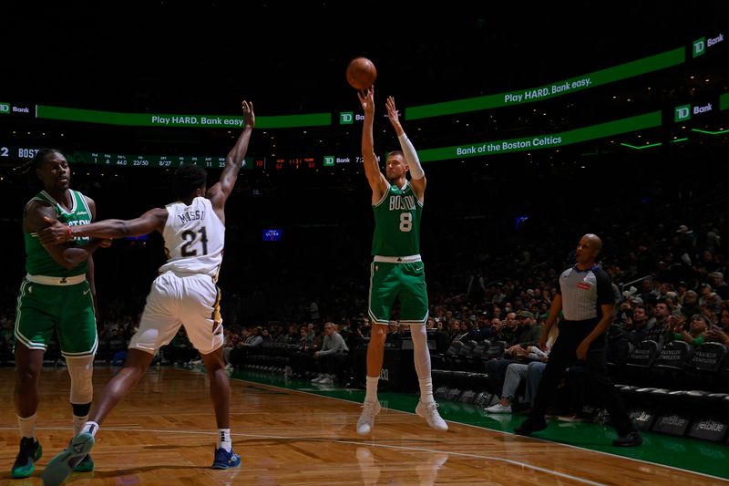 BOSTON, MA - JANUARY 12: Kristaps Porzingis #8 of the Boston Celtics shoots a three point basket during the game against the New Orleans Pelicans on January 12, 2025 at TD Garden in Boston, Massachusetts. NOTE TO USER: User expressly acknowledges and agrees that, by downloading and/or using this Photograph, user is consenting to the terms and conditions of the Getty Images License Agreement. Mandatory Copyright Notice: Copyright 2025 NBAE (Photo by Brian Babineau/NBAE via Getty Images)