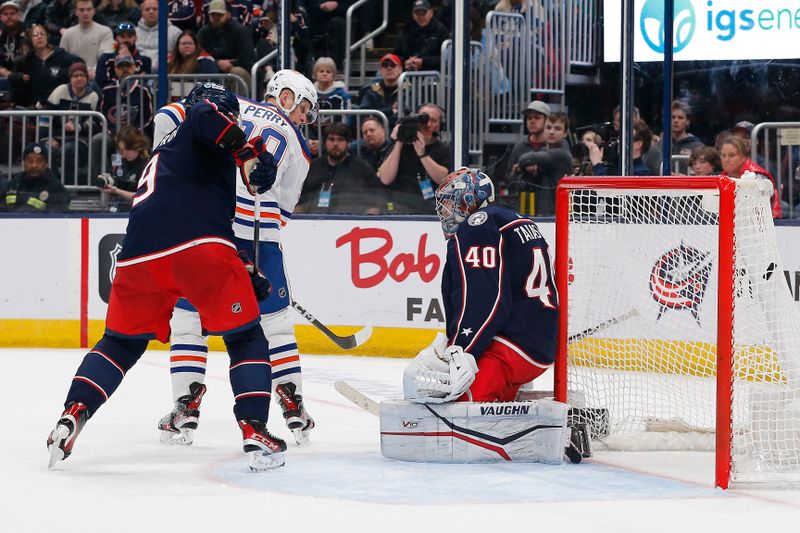 Mar 7, 2024; Columbus, Ohio, USA; Edmonton Oilers right wing Corey Perry (90) tips the puck past Columbus Blue Jackets goalie Daniil Tarasov (40) for a goal during the third period at Nationwide Arena. Mandatory Credit: Russell LaBounty-USA TODAY Sports