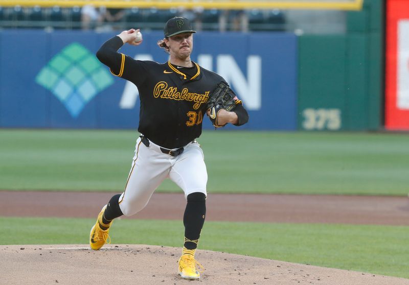 Sep 9, 2024; Pittsburgh, Pennsylvania, USA;  Pittsburgh Pirates starting pitcher Paul Skenes (30) delivers a pitch against the Miami Marlins during the first inning at PNC Park. Mandatory Credit: Charles LeClaire-Imagn Images