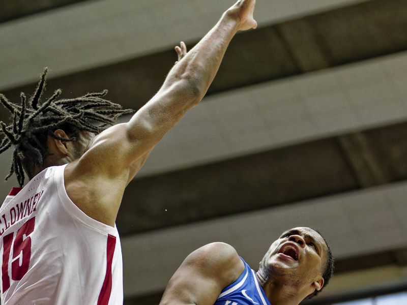 Jan 7, 2023; Tuscaloosa, Alabama, USA; Kentucky Wildcats guard Sahvir Wheeler (2) shoots against Alabama Crimson Tide forward Noah Clowney (15) during first half at Coleman Coliseum. Mandatory Credit: Marvin Gentry-USA TODAY Sports