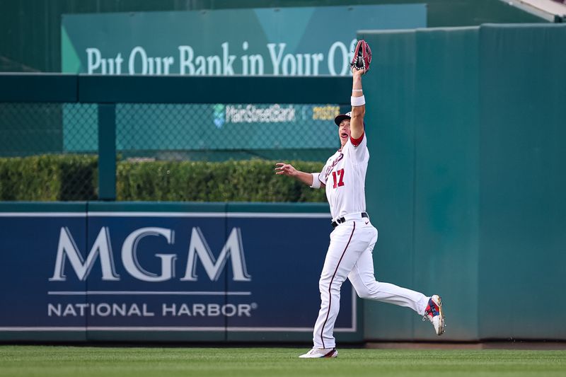 Jun 7, 2023; Washington, District of Columbia, USA; Washington Nationals center fielder Alex Call (17) makes a catch to retire Arizona Diamondbacks left fielder Corbin Carroll (7- not pictured) during the second inning at Nationals Park. Mandatory Credit: Scott Taetsch-USA TODAY Sports