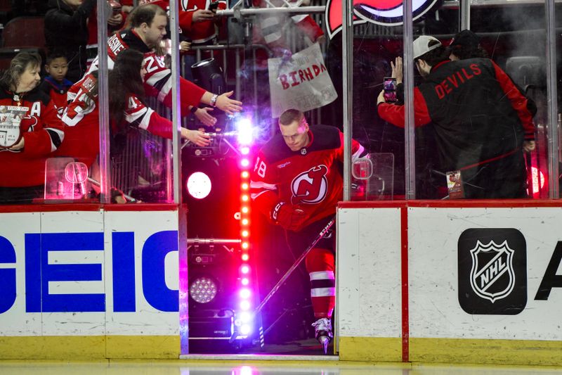 Feb 25, 2024; Newark, New Jersey, USA; New Jersey Devils left wing Brian Halonen (48) enters the ice for his rookie skate lap before a game against the Tampa Bay Lightning at Prudential Center. Mandatory Credit: John Jones-USA TODAY Sports