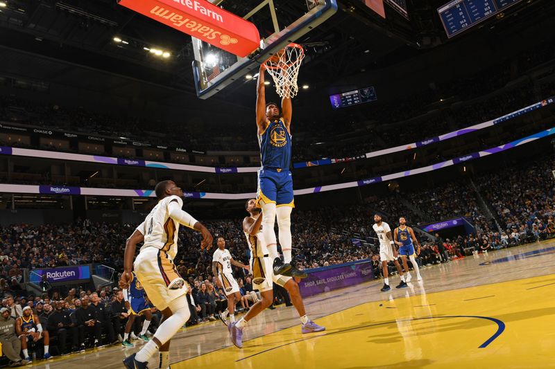 SAN FRANCISCO, CA - OCTOBER 30: Trayce Jackson-Davis #32 of the Golden State Warriors dunks the ball during the game against the New Orleans Pelicans on October 30, 2024 at Chase Center in San Francisco, California. NOTE TO USER: User expressly acknowledges and agrees that, by downloading and or using this photograph, user is consenting to the terms and conditions of Getty Images License Agreement. Mandatory Copyright Notice: Copyright 2024 NBAE (Photo by Noah Graham/NBAE via Getty Images)