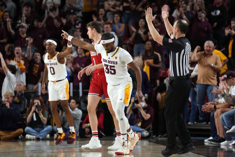 Feb 18, 2023; Tempe, Arizona, USA; Arizona State Sun Devils guard Devan Cambridge (35) celebrates a basket against the Utah Utes during the first half at Desert Financial Arena. Mandatory Credit: Joe Camporeale-USA TODAY Sports