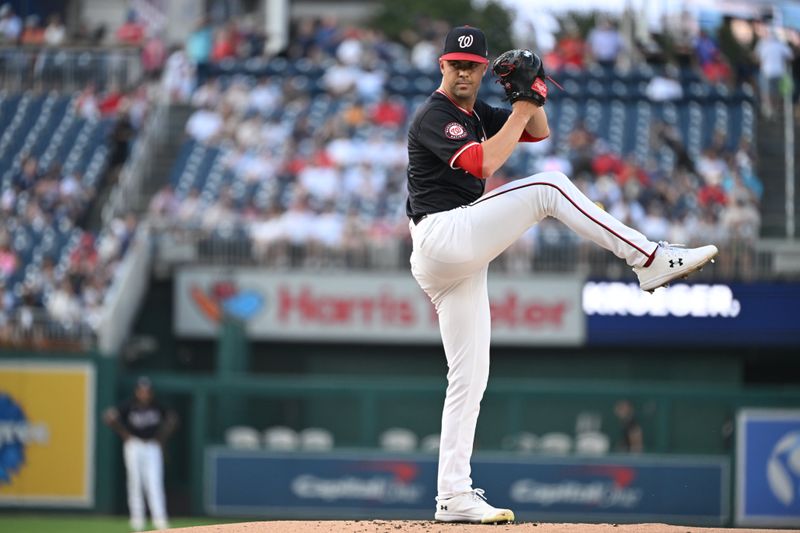 Aug 28, 2024; Washington, District of Columbia, USA; Washington Nationals starting pitcher MacKenzie Gore (1) prepares to throw a pitch against the New York Yankees during the first inning at Nationals Park. Mandatory Credit: Rafael Suanes-USA TODAY Sports