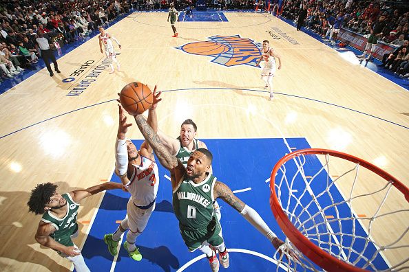 NEW YORK, NY - DECEMBER 25: Damian Lillard #0 of the Milwaukee Bucks rebounds during the game against the New York Knicks on December 25, 2023 at Madison Square Garden in New York City, New York.  NOTE TO USER: User expressly acknowledges and agrees that, by downloading and or using this photograph, User is consenting to the terms and conditions of the Getty Images License Agreement. Mandatory Copyright Notice: Copyright 2023 NBAE  (Photo by Nathaniel S. Butler/NBAE via Getty Images)