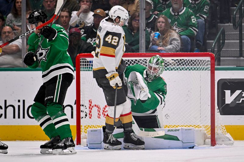Mar 10, 2026; Dallas, Texas, USA; Dallas Stars goaltender Jake Oettinger (29) makes a save in front of Vegas Golden Knights right wing Braeden Bowman (42) during the second period at the American Airlines Center. Mandatory Credit: Jerome Miron-Imagn Images