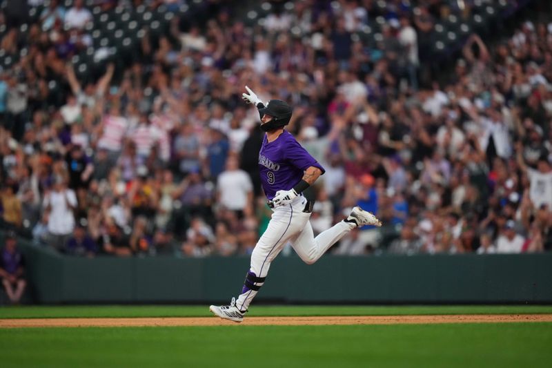 Jul 19, 2024; Denver, Colorado, USA; Colorado Rockies outfielder Brenton Doyle (9) runs off a two run home run in the sixth inning against the San Francisco Giants at Coors Field. Mandatory Credit: Ron Chenoy-USA TODAY Sports