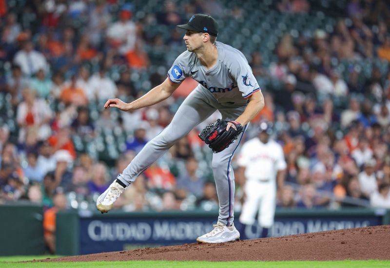 Jul 10, 2024; Houston, Texas, USA; Miami Marlins starting pitcher Bryan Hoeing (78) delivers a pitch during the first inning against the Houston Astros at Minute Maid Park. Mandatory Credit: Troy Taormina-USA TODAY Sports