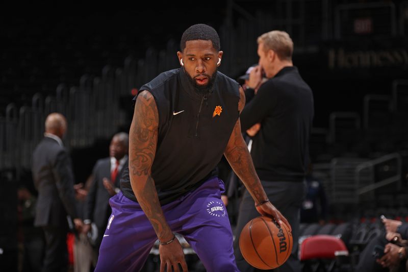 WASHINGTON, DC -?JANUARY 16 : Royce O'Neale #00 of the Phoenix Suns warms up before the game against the Washington Wizards on January 16 2025 at Capital One Arena in Washington, DC. NOTE TO USER: User expressly acknowledges and agrees that, by downloading and or using this Photograph, user is consenting to the terms and conditions of the Getty Images License Agreement. Mandatory Copyright Notice: Copyright 2024 NBAE (Photo by Stephen Gosling/NBAE via Getty Images)