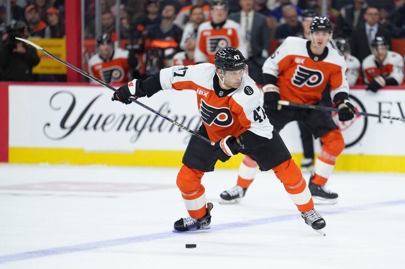 Nov 1, 2025; Philadelphia, Pennsylvania, USA; Philadelphia Flyers defenseman Noah Juulsen (47) shoots the puck against the Toronto Maple Leafs in the second period at Xfinity Mobile Arena. Mandatory Credit: Kyle Ross-Imagn Images