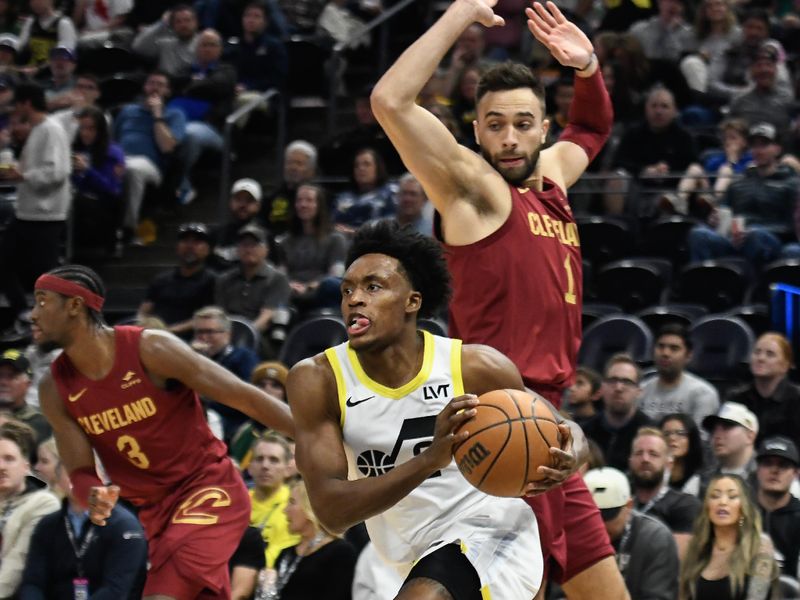 SALT LAKE CITY, UTAH - APRIL 02: Collin Sexton #2 of the Utah Jazz drives against Max Strus #1 of the Cleveland Cavaliers during the first half of a game at Delta Center on April 02, 2024 in Salt Lake City, Utah. NOTE TO USER: User expressly acknowledges and agrees that, by downloading and or using this photograph, User is consenting to the terms and conditions of the Getty Images License Agreement. (Photo by Alex Goodlett/Getty Images)