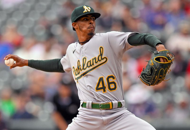 Sep 28, 2023; Minneapolis, Minnesota, USA; Oakland Athletics pitcher Luis Medina (46) delivers a pitch against the Minnesota Twins during the first inning at Target Field. Mandatory Credit: Nick Wosika-USA TODAY Sports