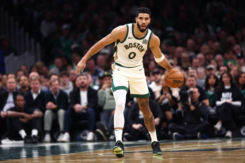 BOSTON, MASSACHUSETTS - NOVEMBER 10: Jayson Tatum #0 of the Boston Celtics dribbles downcourt during the second quarter of the In-Season Tournament game against the Brooklyn Nets at TD Garden on November 10, 2023 in Boston, Massachusetts. NOTE TO USER: User expressly acknowledges and agrees that, by downloading and or using this photograph, User is consenting to the terms and conditions of the Getty Images License Agreement. (Photo by Maddie Meyer/Getty Images)