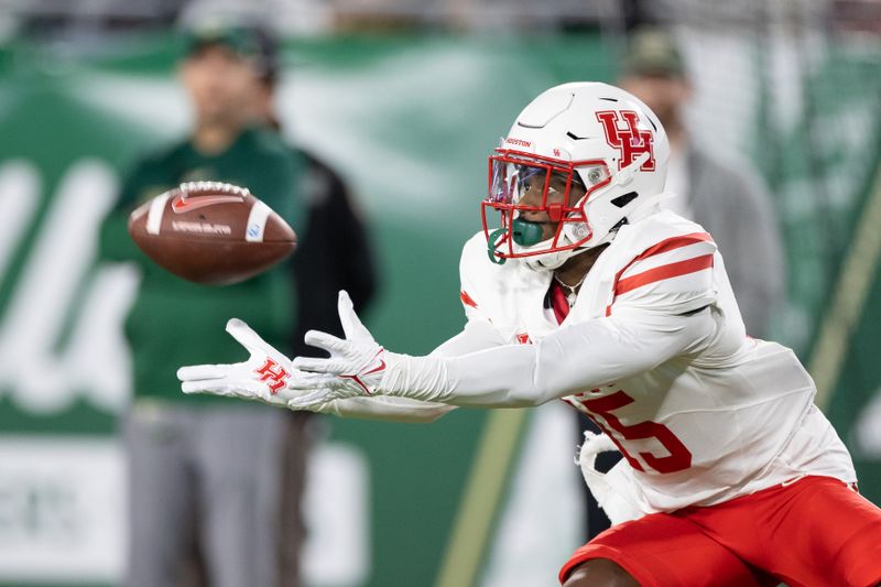 Nov 6, 2021; Tampa, Florida, USA; Houston Cougars wide receiver Jaylen Erwin (15) catches the ball on the 6 yard line during a punt during the first quarter against the South Florida Bulls at Raymond James Stadium. Mandatory Credit: Matt Pendleton-USA TODAY Sports
