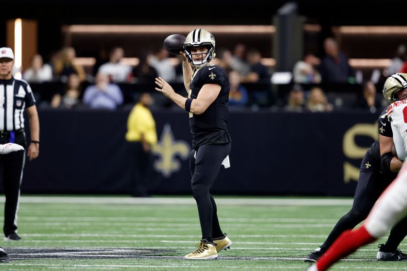 New Orleans Saints quarterback Derek Carr (4) during an NFL football game against the New York Giants, Sunday, Dec. 17, 2023, in New Orleans. (AP Photo/Tyler Kaufman)