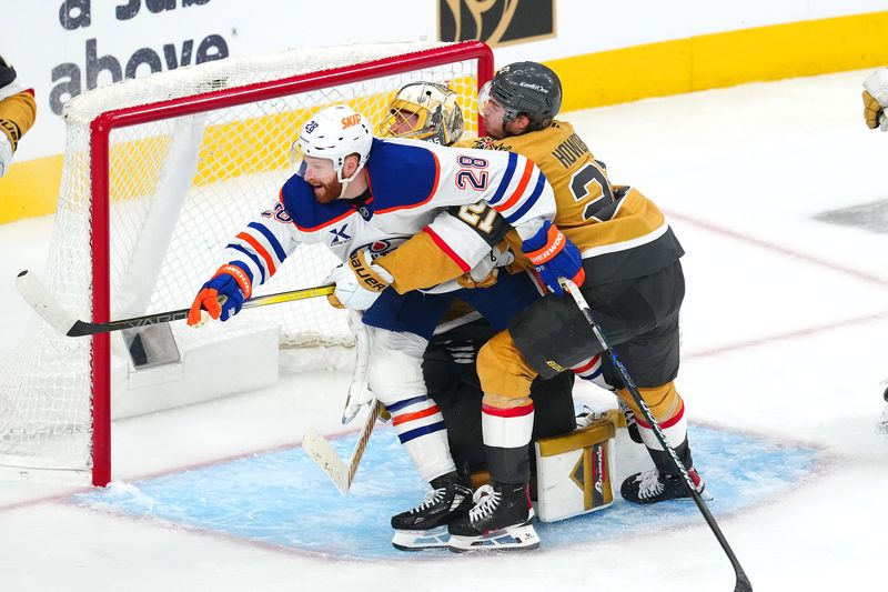 May 6, 2025; Las Vegas, Nevada, USA; Edmonton Oilers right wing Connor Brown (28) interferes with Vegas Golden Knights goaltender Adin Hill (33) as he attempts to elude center Brett Howden (21) during the third period of game one of the second round of the 2025 Stanley Cup Playoffs at T-Mobile Arena. Mandatory Credit: Stephen R. Sylvanie-Imagn Images