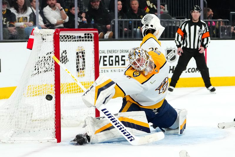 Feb 20, 2024; Las Vegas, Nevada, USA; Nashville Predators goaltender Kevin Lankinen (32) makes a save against the Vegas Golden Knights during the second period at T-Mobile Arena. Mandatory Credit: Stephen R. Sylvanie-USA TODAY Sports