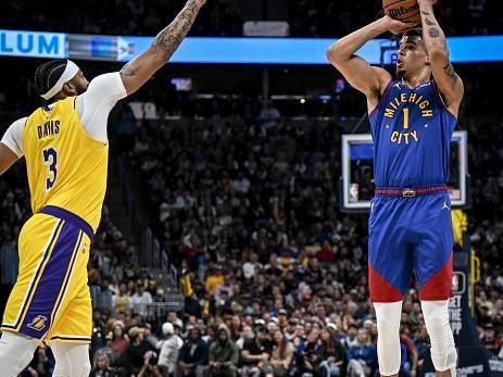 DENVER, CO - OCTOBER 24: Michael Porter Jr. (1) of the Denver Nuggets shots over Anthony Davis (3) of the Los Angeles Lakers during the first quarter at Ball Arena in Denver on Tuesday, October 24, 2023. (Photo by AAron Ontiveroz/The Denver Post)