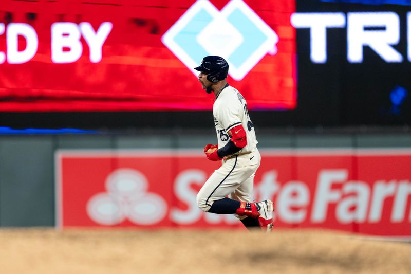 Apr 23, 2024; Minneapolis, Minnesota, USA; Minnesota Twins outfielder Byron Buxton (25) hits a home run in the ninth inning to tie the game at five against the Chicago White Sox at Target Field. Mandatory Credit: Matt Blewett-USA TODAY Sports