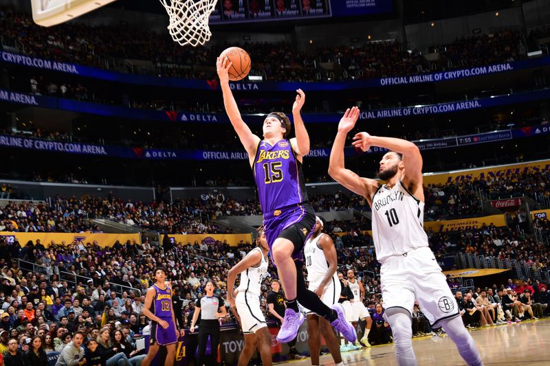 LOS ANGELES, CA - JANUARY 17: Austin Reaves #15 of the Los Angeles Lakers drives to the basket during the game against the Brooklyn Nets on January 17, 2025 at Crypto.Com Arena in Los Angeles, California. NOTE TO USER: User expressly acknowledges and agrees that, by downloading and/or using this Photograph, user is consenting to the terms and conditions of the Getty Images License Agreement. Mandatory Copyright Notice: Copyright 2025 NBAE (Photo by Adam Pantozzi/NBAE via Getty Images)