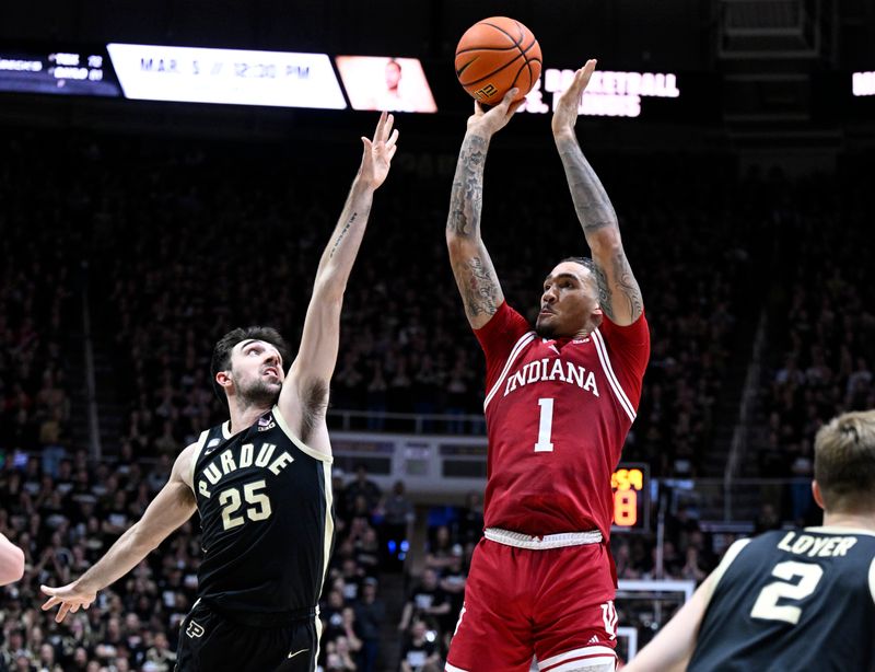 Feb 25, 2023; West Lafayette, Indiana, USA; Indiana Hoosiers guard Jalen Hood-Schifino (1) shoots the ball against Purdue Boilermakers guard Ethan Morton (25) during the first half at Mackey Arena. Mandatory Credit: Marc Lebryk-USA TODAY Sports