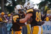 Wyoming Cowboys' Effort Falls Short Against BYU Cougars in Laramie Showdown