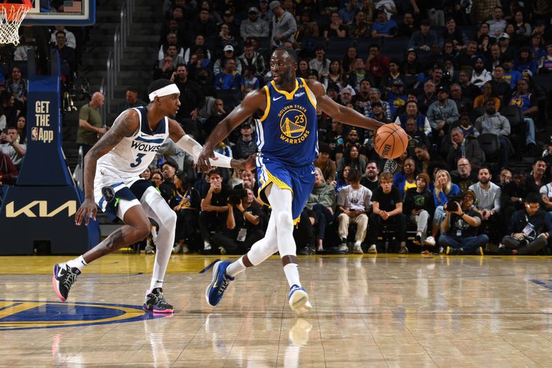 SAN FRANCISCO, CA - DECEMBER 6: Draymond Green #23 of the Golden State Warriors handles the ball during the game against the Minnesota Timberwolves on December 6, 2024 at Chase Center in San Francisco, California. NOTE TO USER: User expressly acknowledges and agrees that, by downloading and or using this photograph, user is consenting to the terms and conditions of Getty Images License Agreement. Mandatory Copyright Notice: Copyright 2024 NBAE (Photo by Noah Graham/NBAE via Getty Images)