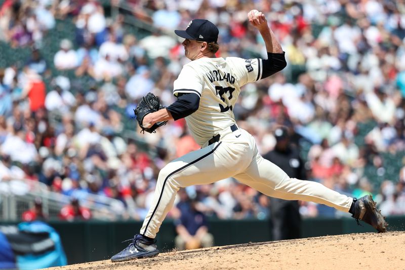 May 25, 2025; Minneapolis, Minnesota, USA; Minnesota Twins pitcher Louis Varland (37) delivers a pitch against the Kansas City Royals during the seventh inning at Target Field. Mandatory Credit: Matt Krohn-Imagn Images
