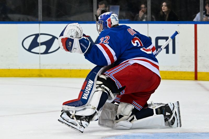 Nov 7, 2024; New York, New York, USA;  New York Rangers goaltender Jonathan Quick (32) makes a save against the Buffalo Sabres during the third period at Madison Square Garden. Mandatory Credit: Dennis Schneidler-Imagn Images