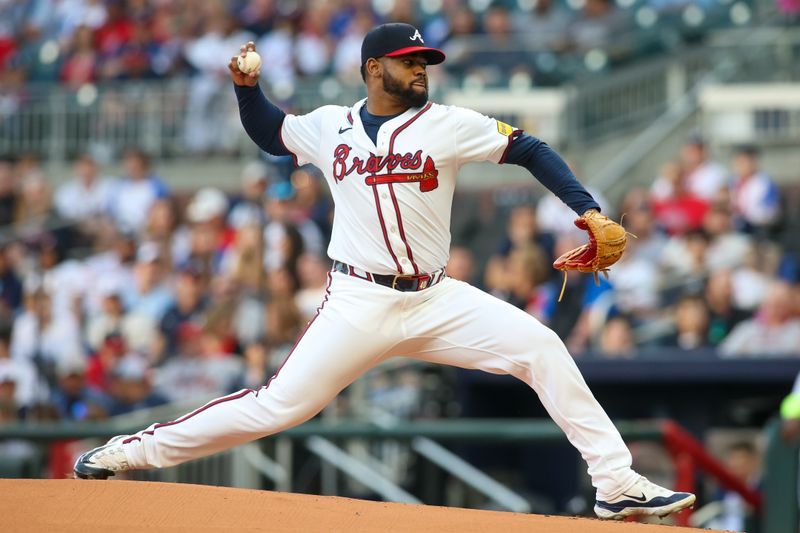 Apr 24, 2024; Atlanta, Georgia, USA; Atlanta Braves starting pitcher Reynaldo Lopez (40) throws against the Miami Marlins in the first inning at Truist Park. Mandatory Credit: Brett Davis-USA TODAY Sports
