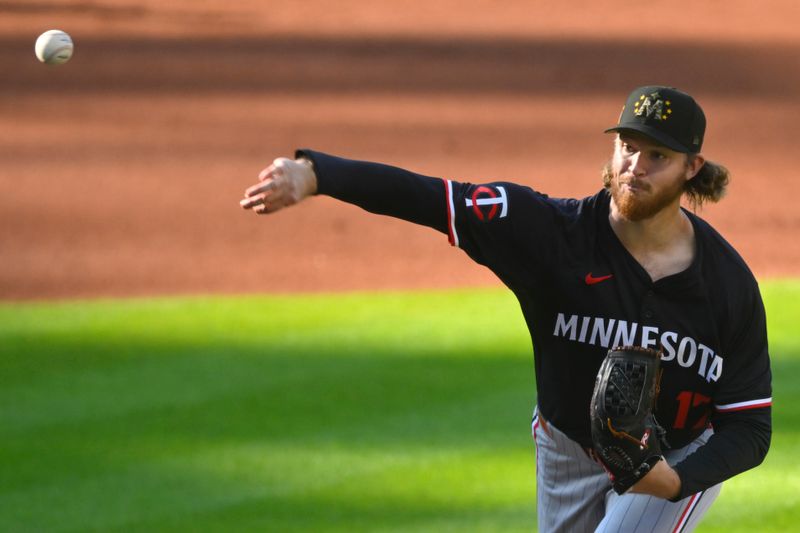 May 18, 2024; Cleveland, Ohio, USA; Minnesota Twins starting pitcher Bailey Ober (17) delivers a pitch in the first inning against the Cleveland Guardians at Progressive Field. Mandatory Credit: David Richard-USA TODAY Sports