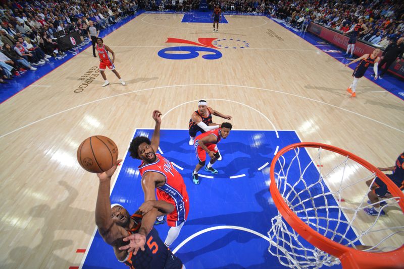 PHILADELPHIA, PA - APRIL 28: Precious Achiuwa #5 of the New York Knicks drives to the basket during the game against the Philadelphia 76ers during Round 1 Game 4 of the 2024 NBA Playoffs on April 28, 2024 at the Wells Fargo Center in Philadelphia, Pennsylvania NOTE TO USER: User expressly acknowledges and agrees that, by downloading and/or using this Photograph, user is consenting to the terms and conditions of the Getty Images License Agreement. Mandatory Copyright Notice: Copyright 2024 NBAE (Photo by Jesse D. Garrabrant/NBAE via Getty Images)