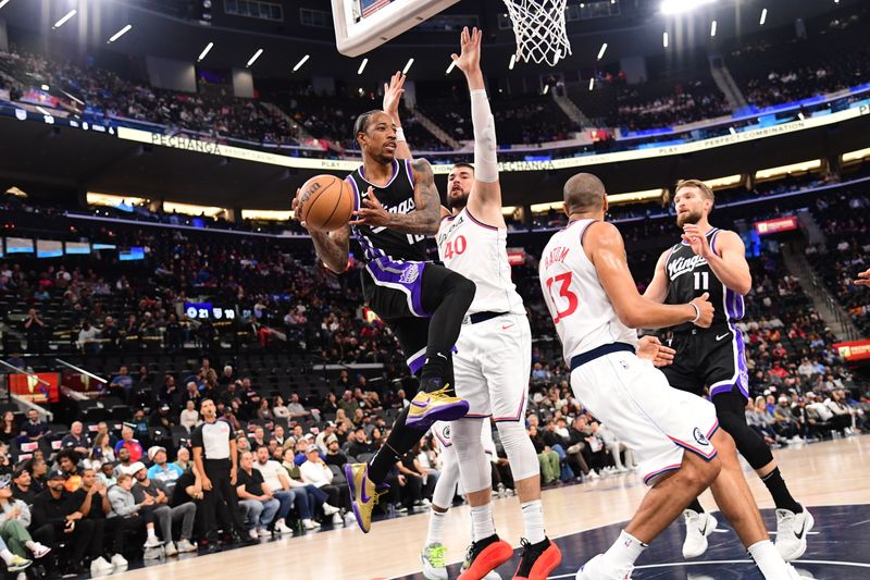 INGLEWOOD, CA - OCTOBER 17: DeMar DeRozan #10 of the Sacramento Kings handles the ball during the game against the LA Clippers during a NBA Preseason game on October 17, 2024 at Intuit Dome in Los Angeles, California. NOTE TO USER: User expressly acknowledges and agrees that, by downloading and/or using this Photograph, user is consenting to the terms and conditions of the Getty Images License Agreement. Mandatory Copyright Notice: Copyright 2024 NBAE (Photo by Adam Pantozzi/NBAE via Getty Images)