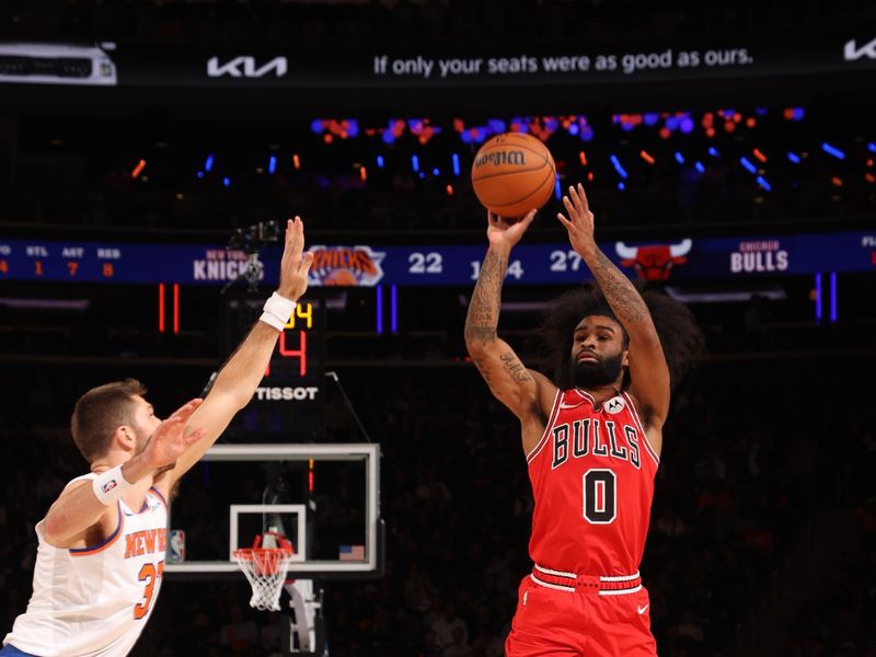 NEW YORK, NY - NOVEMBER 13: Coby White #0 of the Chicago Bulls shoots a three point basket during the game against the New York Knicks on November 13, 2024 at Madison Square Garden in New York City, New York.  NOTE TO USER: User expressly acknowledges and agrees that, by downloading and or using this photograph, User is consenting to the terms and conditions of the Getty Images License Agreement. Mandatory Copyright Notice: Copyright 2024 NBAE  (Photo by Joe Murphy/NBAE via Getty Images)