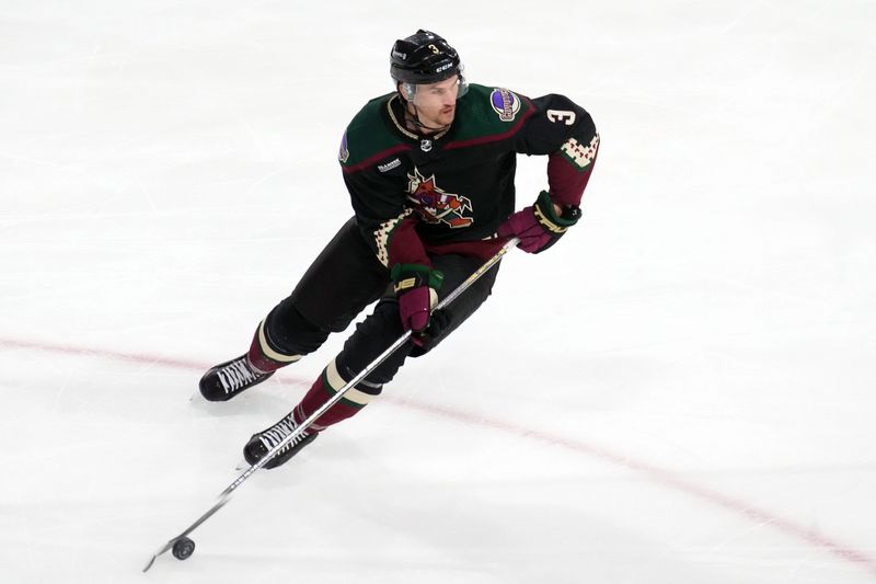 Dec 7, 2023; Tempe, Arizona, USA; Arizona Coyotes defenseman Josh Brown (3) skates the puck against the Philadelphia Flyers during the third period at Mullett Arena. Mandatory Credit: Joe Camporeale-USA TODAY Sports